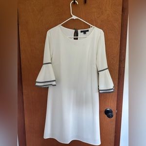 White dress with bell sleeves. Never worn, new with tags